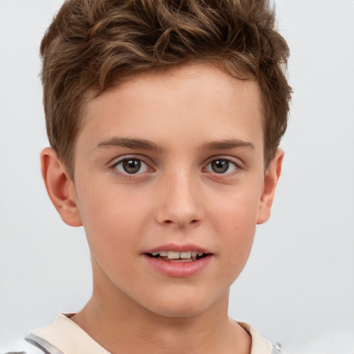 Joyful white child male with short  brown hair and brown eyes