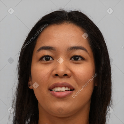 Joyful asian young-adult female with long  brown hair and brown eyes