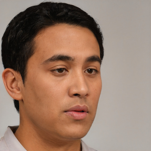 Neutral asian young-adult male with short  brown hair and brown eyes