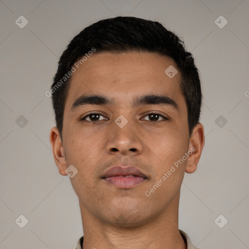 Neutral latino young-adult male with short  black hair and brown eyes