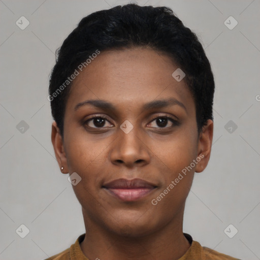 Joyful black young-adult female with short  black hair and brown eyes