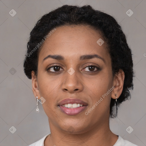 Joyful latino young-adult female with short  brown hair and brown eyes