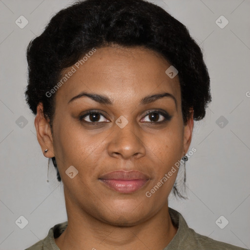 Joyful black young-adult female with short  black hair and brown eyes