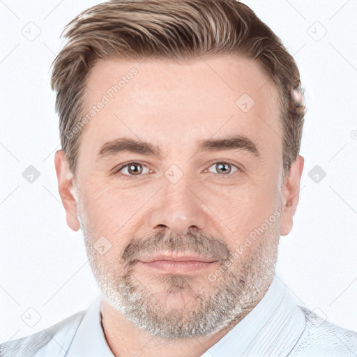 Joyful white adult male with short  brown hair and grey eyes