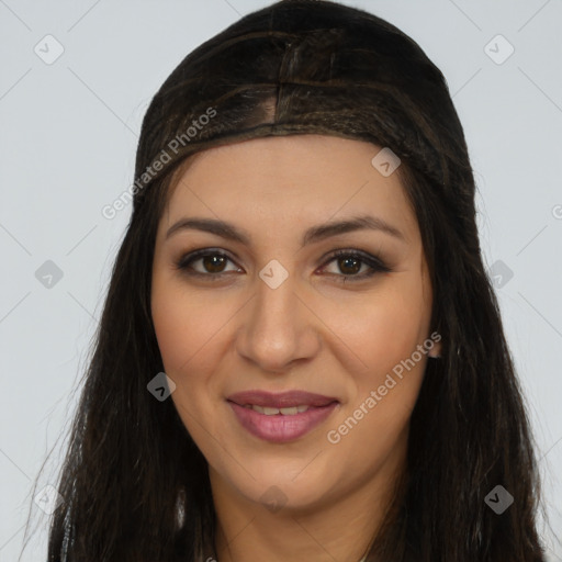 Joyful latino young-adult female with long  brown hair and brown eyes