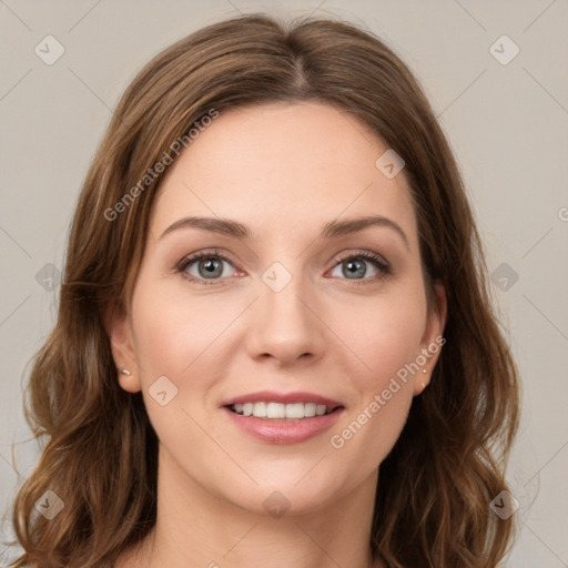 Joyful white young-adult female with long  brown hair and green eyes