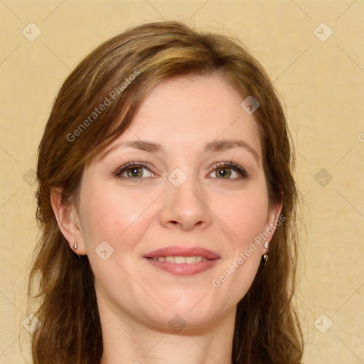 Joyful white young-adult female with long  brown hair and green eyes