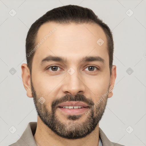 Joyful white young-adult male with short  black hair and brown eyes