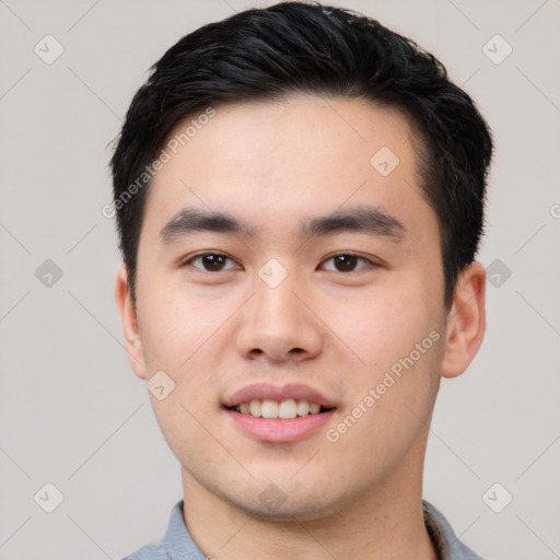 Joyful white young-adult male with short  black hair and brown eyes