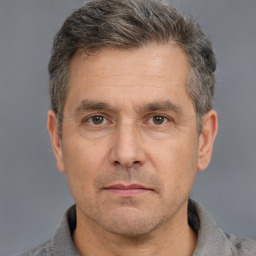 Neutral white adult male with short  brown hair and brown eyes