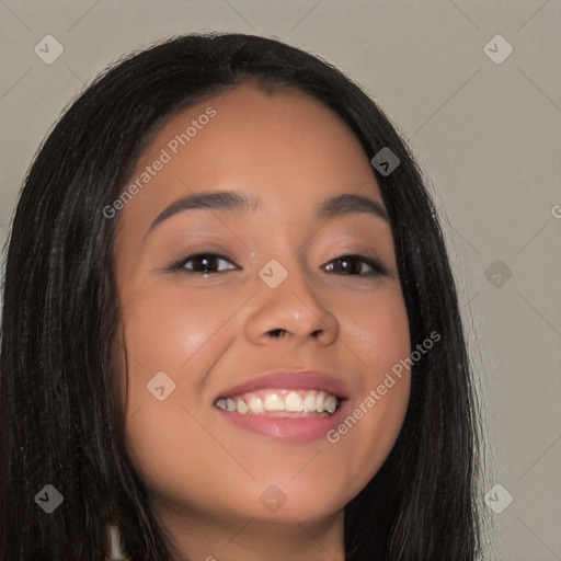 Joyful latino young-adult female with long  brown hair and brown eyes