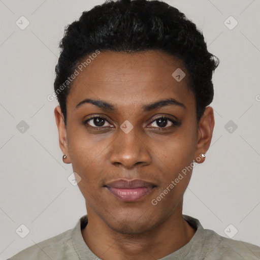Joyful black young-adult female with short  black hair and brown eyes