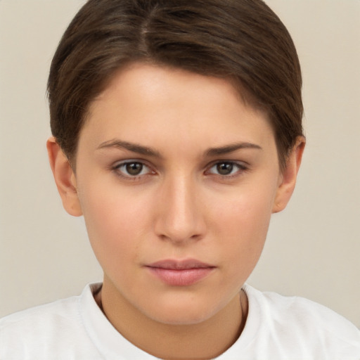 Neutral white young-adult female with short  brown hair and brown eyes