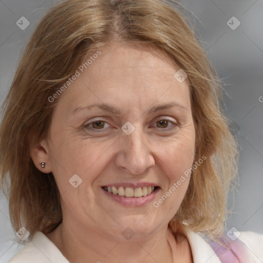 Joyful white adult female with medium  brown hair and brown eyes