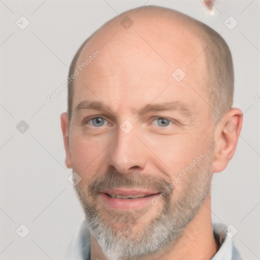 Joyful white adult male with short  brown hair and grey eyes