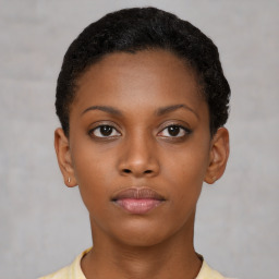 Neutral black young-adult female with short  brown hair and brown eyes