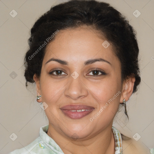 Joyful latino adult female with medium  brown hair and brown eyes