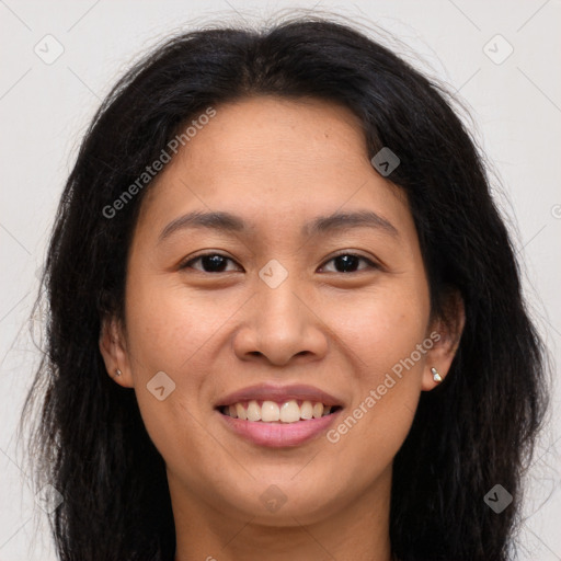 Joyful asian young-adult female with long  brown hair and brown eyes