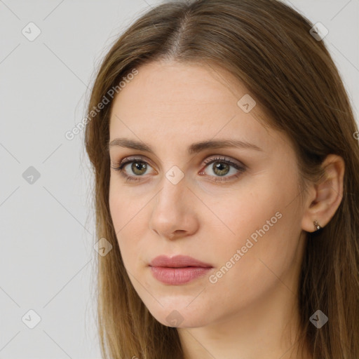 Neutral white young-adult female with long  brown hair and brown eyes