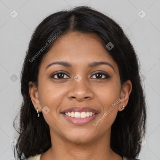 Joyful black young-adult female with medium  brown hair and brown eyes