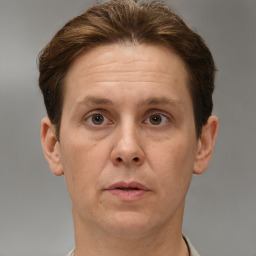 Neutral white adult male with short  brown hair and brown eyes