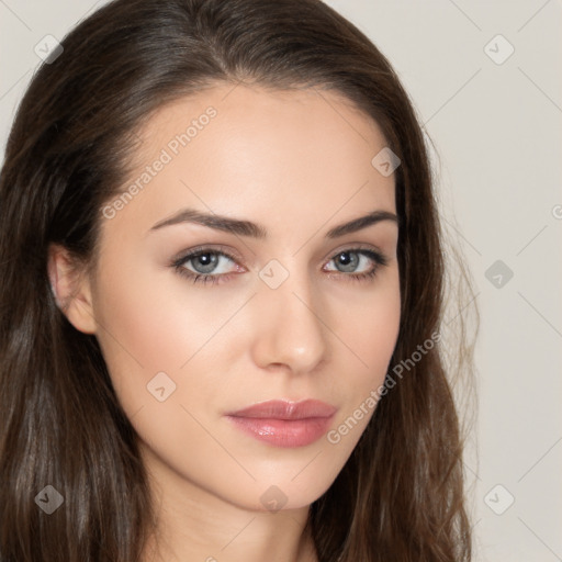 Neutral white young-adult female with long  brown hair and brown eyes