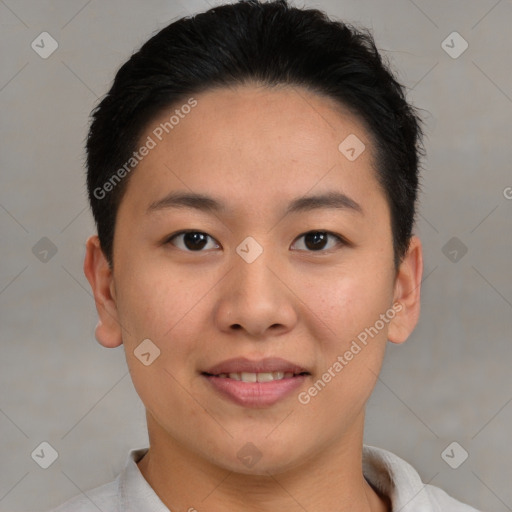 Joyful asian young-adult female with short  brown hair and brown eyes