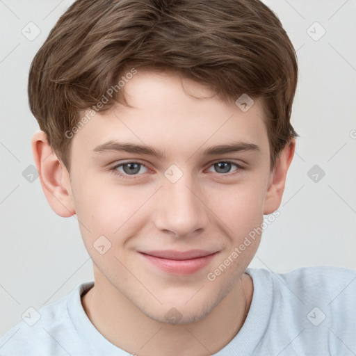 Joyful white child male with short  brown hair and brown eyes