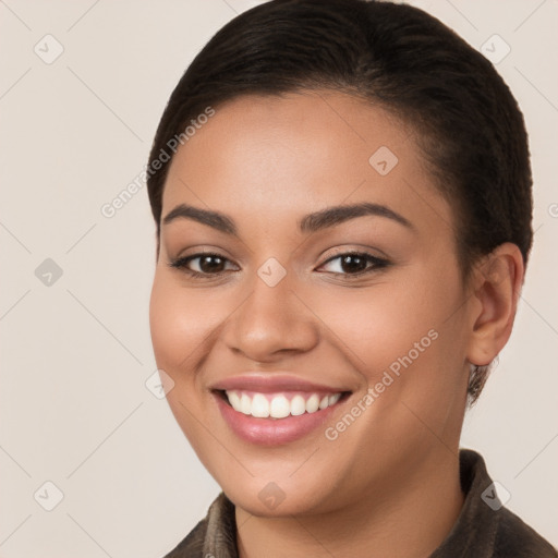 Joyful white young-adult female with long  brown hair and brown eyes