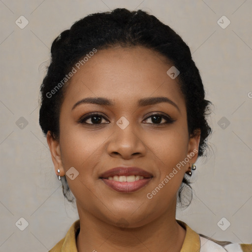 Joyful black young-adult female with long  black hair and brown eyes