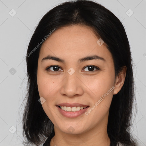 Joyful asian young-adult female with medium  brown hair and brown eyes