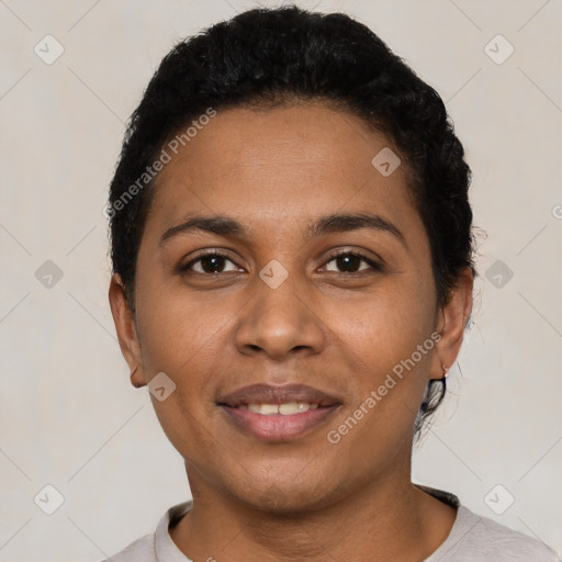 Joyful latino young-adult female with short  black hair and brown eyes