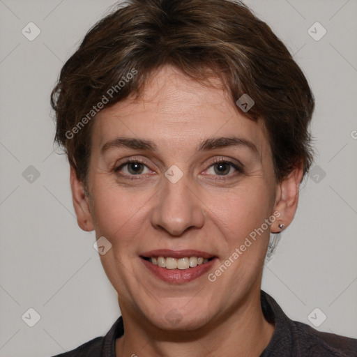 Joyful white adult female with short  brown hair and brown eyes