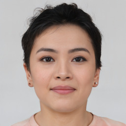 Joyful asian young-adult female with short  brown hair and brown eyes