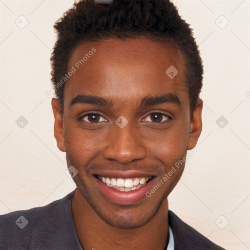 Joyful black young-adult male with short  brown hair and brown eyes