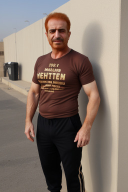 Iraqi middle-aged male with  ginger hair