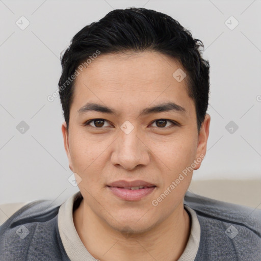 Joyful asian young-adult male with short  black hair and brown eyes