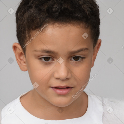 Joyful white child male with short  brown hair and brown eyes