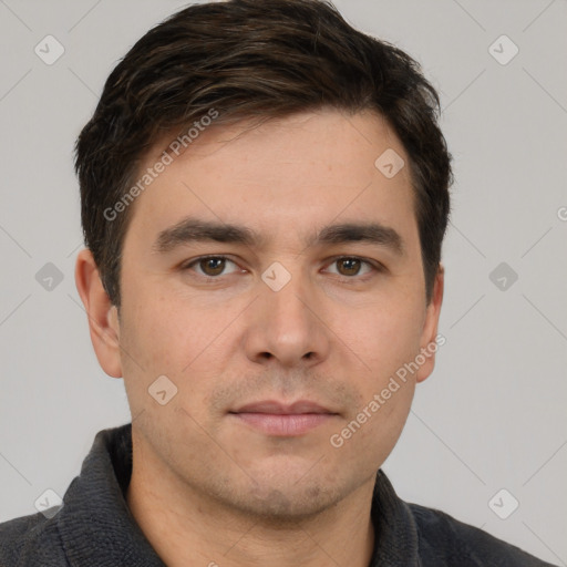 Neutral white young-adult male with short  brown hair and brown eyes