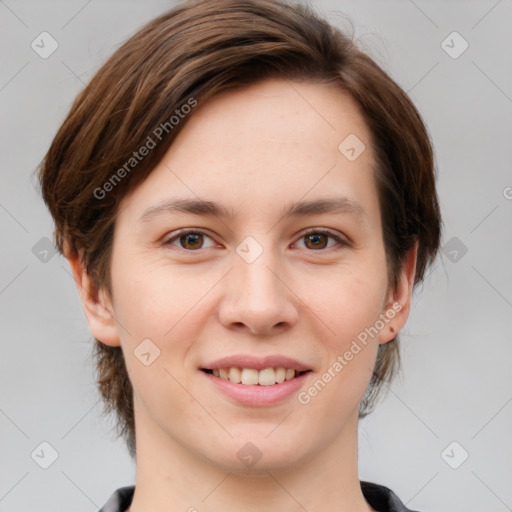 Joyful white young-adult female with medium  brown hair and green eyes