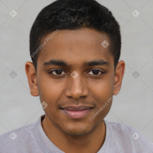 Joyful black young-adult male with short  brown hair and brown eyes