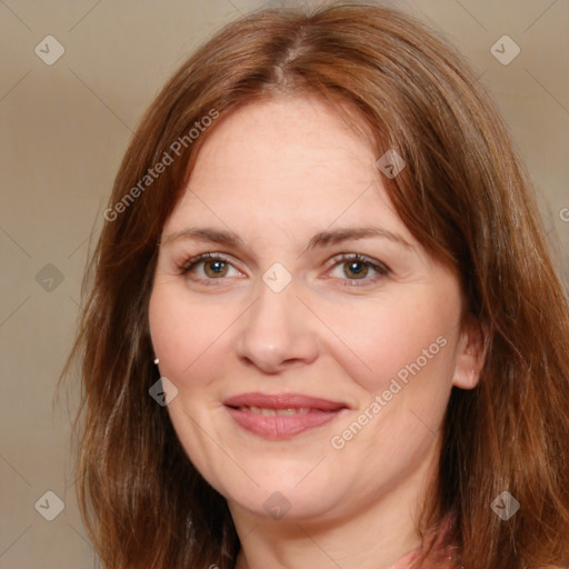 Joyful white adult female with medium  brown hair and brown eyes