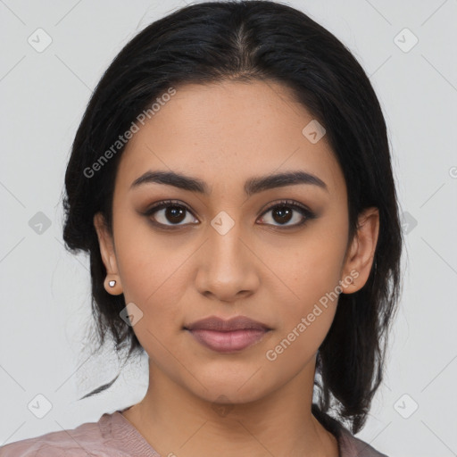 Joyful latino young-adult female with medium  black hair and brown eyes