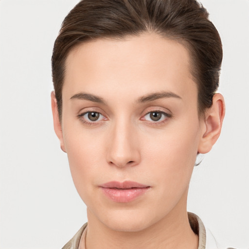 Neutral white young-adult female with short  brown hair and brown eyes