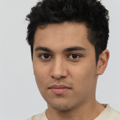 Neutral white young-adult male with short  black hair and brown eyes
