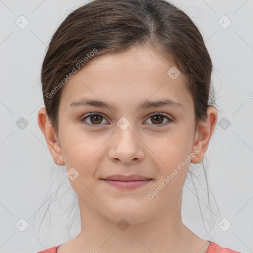 Joyful white child female with medium  brown hair and brown eyes