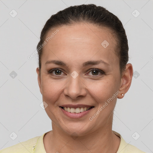 Joyful white adult female with short  brown hair and brown eyes