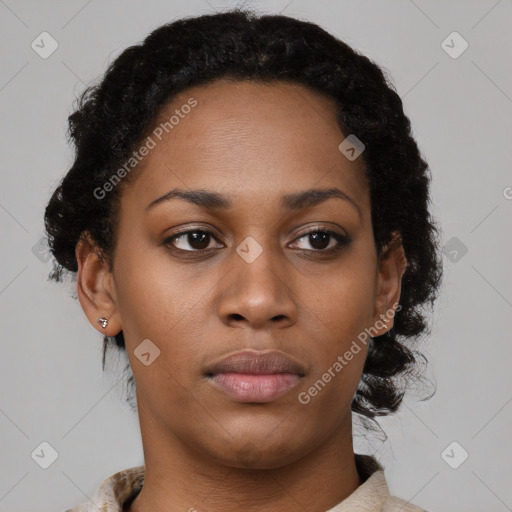 Neutral black young-adult female with short  brown hair and brown eyes