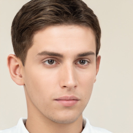 Neutral white young-adult male with short  brown hair and brown eyes