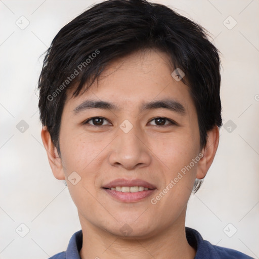 Joyful white young-adult male with short  black hair and brown eyes